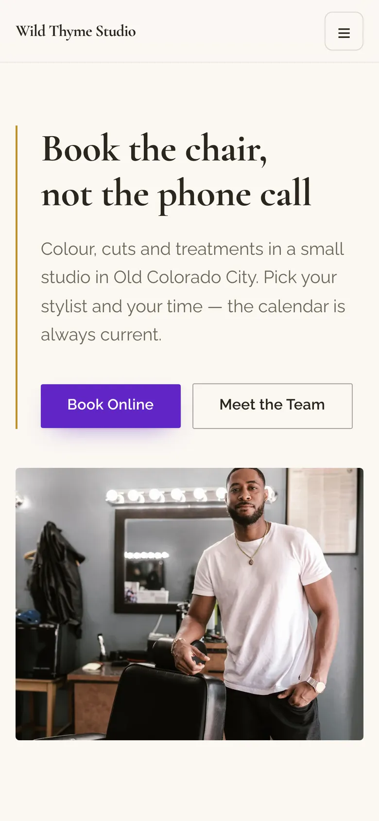 An example salon website on a phone, its own domain name in the address bar.